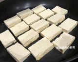 A picture of step 4 of Pan-Fried Tofu and Eggs with Oyster Sauce.