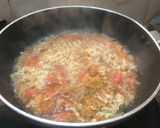 A picture of step 3 of Maggi with tomato onion.