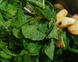 A picture of step 2 of Green prawn Pulao.