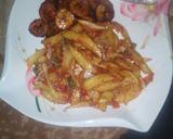 A picture of step 1 of Fried chips nd plantaim with veg.souce.