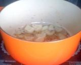 A picture of step 7 of Caramelized Onion Chicken Curry.