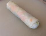 A picture of step 9 of Vietnamese springrolls.