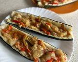 Foto del paso 6 de la receta: Calabacines rellenos de pimientos y queso