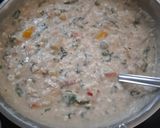A picture of step 4 of Cheesy Mix veggies in white sauce.