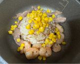 A picture of step 8 of Fried Beef and Shrimp Rice on the Table.