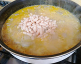 Foto del paso 5 de la receta: Guiso de butifarra al vino con judías y patata