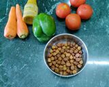 A picture of step 1 of Carrot tomato Black Chana Kasundi.