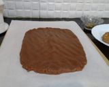 A picture of step 8 of Biscuits Meethi (Swiss roll style).