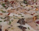 A picture of step 7 of Creamy Parmesan Garlic Chicken and Mushrooms.