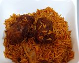 A picture of step 14 of Coconut party jollof rice.