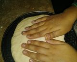A picture of step 2 of ChickenTikka Pizza.