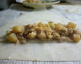 A picture of step 10 of Chicken Roll.