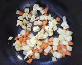 A picture of step 4 of Chirer Polao/ Beaten rice Pulao.