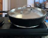 A picture of step 2 of Cambodian grilled chicken over rice.