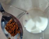 A picture of step 2 of Almond shake in coffie taste.