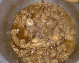 A picture of step 3 of Coconut rice with mutton curry.