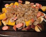 A picture of step 3 of Sheet pan shrimp boil.