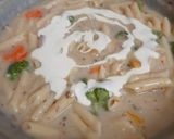 A picture of step 6 of Cheesy and Creamy veggie white sauce penne pasta (with fresh cream, cheese and seasonings).