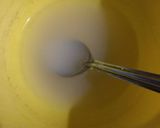 A picture of step 1 of Vanilla Panna cotta in Strawberry Sauce.