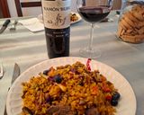 A picture of step 13 of Duck Breast Paella with Cranberries.
