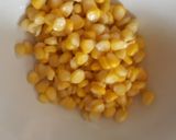 A picture of step 1 of Mango corn salsa.