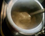 A picture of step 3 of Rajasthani Bajra Khichda (pearl millet).