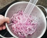 A picture of step 2 of Super Easy Pickled Red Onions.