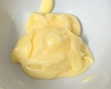 A picture of step 1 of Eggless Mango Cheesecake.
