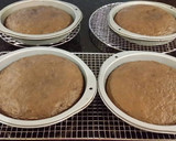 A picture of step 9 of Chocolate Layer Cake with Strawberry Cream Filling, White Chocolate Ganache Frosting coated with a Chocolate Crumble.