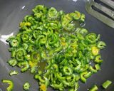 A picture of step 1 of Bitter gourd with onion masala.