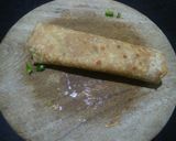 A picture of step 4 of Schezwan aloo roll.