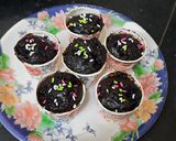 A picture of step 5 of Chocolate cup cakes with harshley Syrup and choco chips.