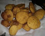A picture of step 8 of Mandazi with cardamom pods #favoritekidsrecipe.