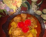 A picture of step 6 of Aloo chicken.