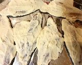 A picture of step 2 of Sea bream in sour cream garlic sauce.