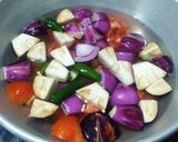 A picture of step 1 of Kathirikai (Brinjal) Khichadi.