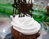 A picture of step 6 of Chocolate cupcakes with froasting ❤❤.