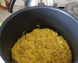 A picture of step 2 of Rice with shredded fish 🐟.