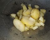 A picture of step 1 of Butter masala sesame potato.