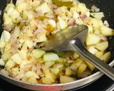 A picture of step 1 of Creamy Herbed Potato Garlic Soup or Cream of Potato Soup.