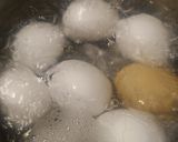 A picture of step 1 of Egg Salad with some extras.