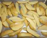 Foto del paso 1 de la receta: Gajos de papas rústicas asadas al romero