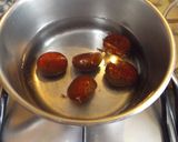 Foto del paso 1 de la receta: Castañas en almíbar recubiertas con chocolate