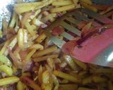 A picture of step 2 of Bengali Gule fish curry with potato & onion.