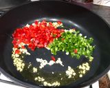 Foto del paso 3 de la receta: Arroz con cuerpos de centollo o cangrejo, cigalas, almejas y calamar