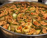 A picture of step 12 of Spicy chicken in zucchini roll-ups.