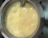A picture of step 3 of Mango custard with gulab jamun.