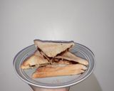 Foto langkah ke 4 dari resep Sarapan Praktis dengan Choco Cheese Grilled Sandwich.