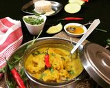 A picture of step 5 of Aam Shorshe Chingri Bhapa (Steamed Mango-Mustard Prawn Curry - Bong style).