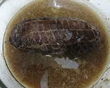 Foto del paso 3 de la receta: Ternera rellena con ciruelas, piñones y orejones al Oporto